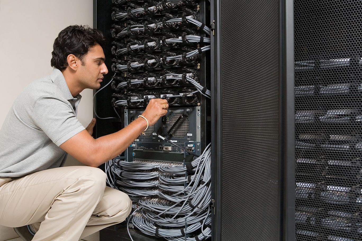 IT technician working on a network